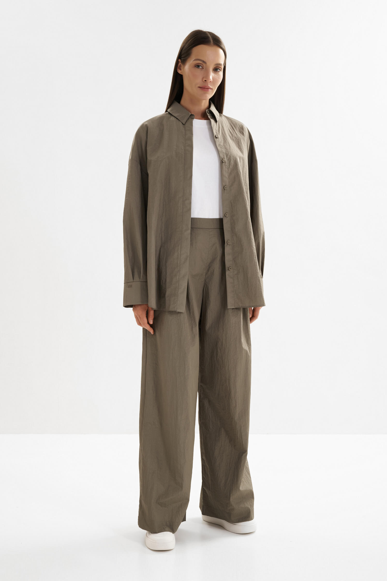 Свободные брюки на резинке Бренд MM